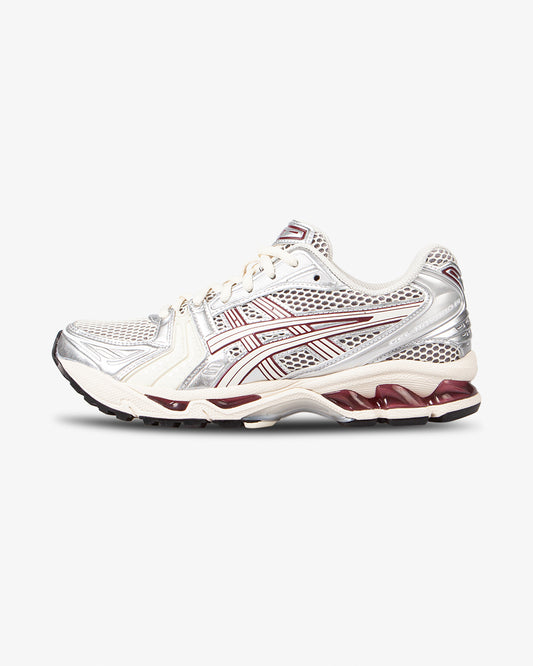 asics shoe, side view, beige shoe, red details