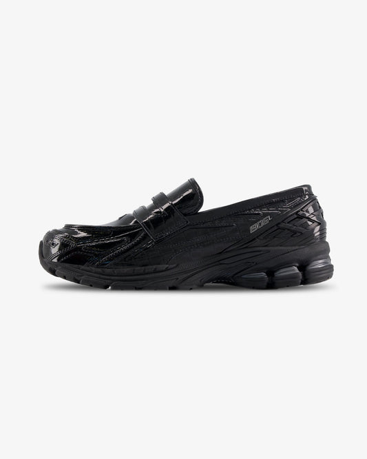 Black New Balance Corc loafer sneaker, side view