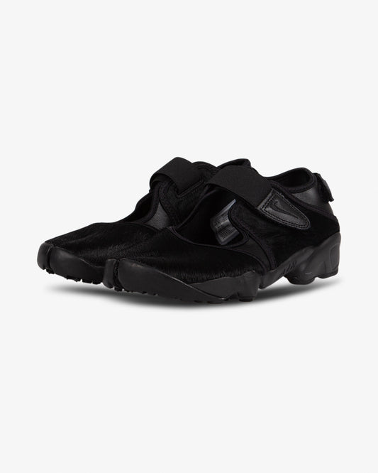 nike black pony hair sneaker, tabi toe, front view