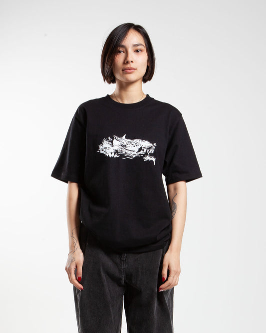 Black Stüssy t-shirt, front view, artwork on chest