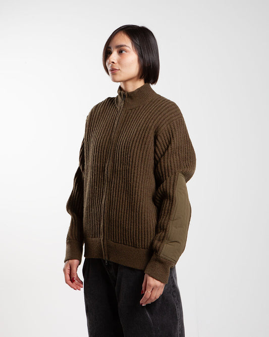 Green Stüssy military patch zip-up, side view