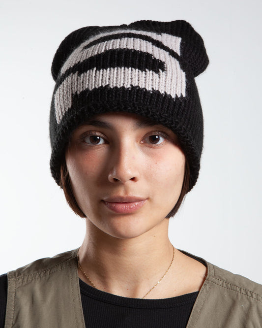 Black Stüssy knit beanie, front view, big logo