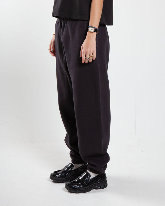 Black Stüssy sweatpant, side view