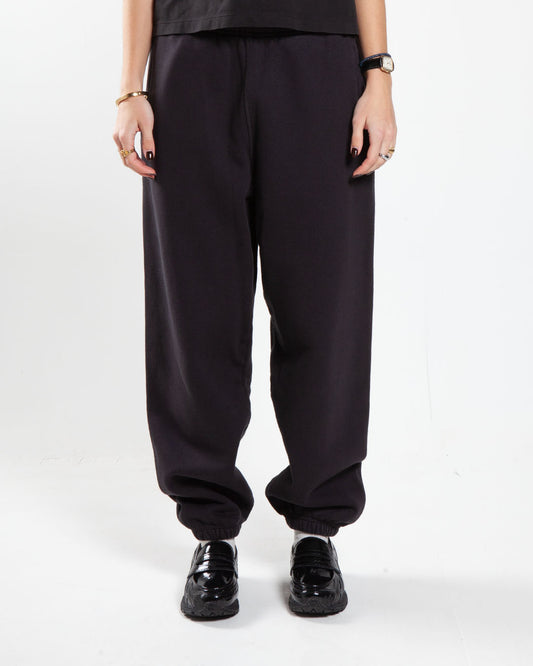 Black Stüssy sweatpant, front view