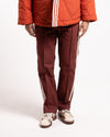 adidas x CLOT Track Pant Fox, brown pants, on model 